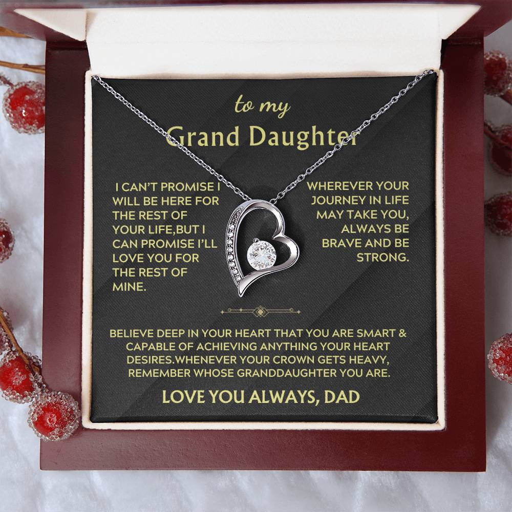 Silver heart necklace in a red presentation box with a Grand Daughter message card