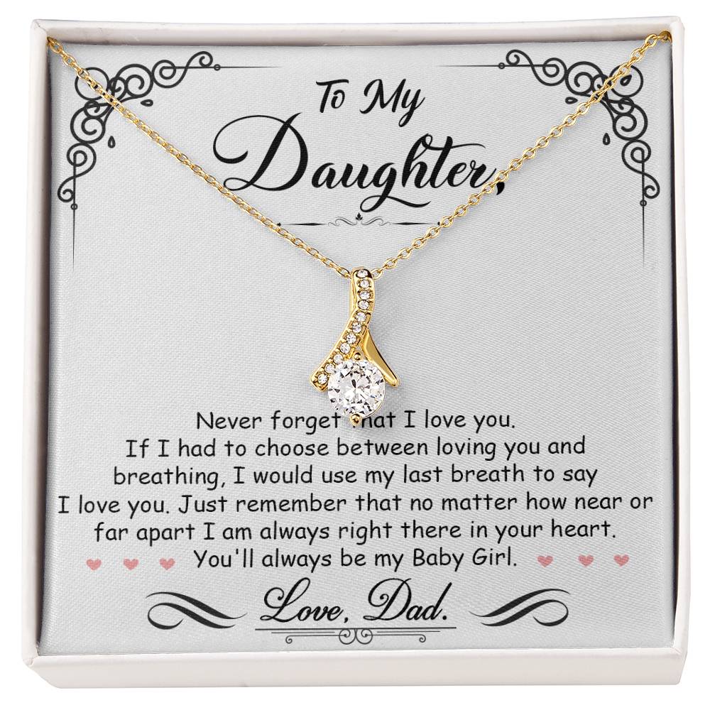Gold ribbon pendant necklace displayed on a daughter message card