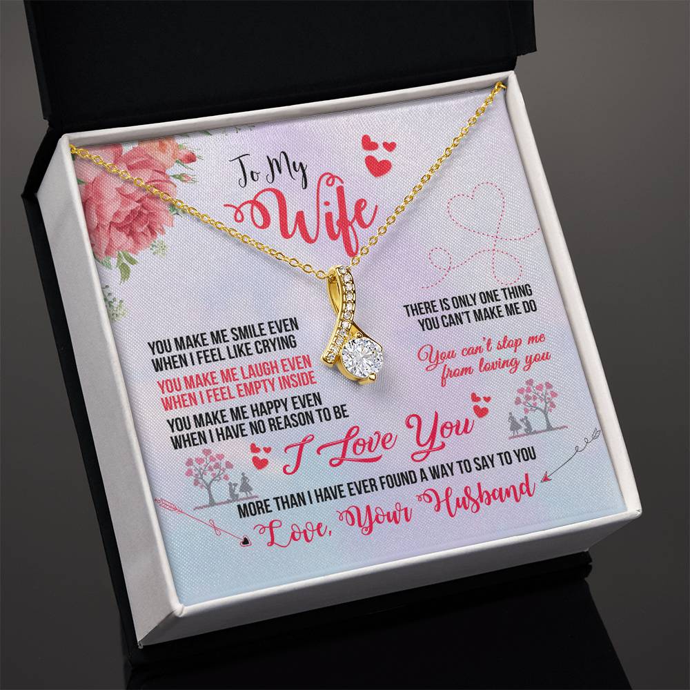 Angled view of a gold-tone To My Wife necklace in an open black presentation box