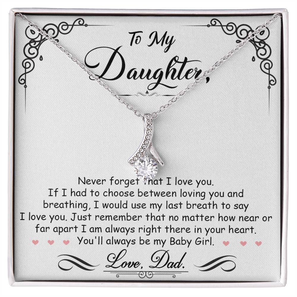 Silver ribbon pendant necklace displayed on a message card for a daughter