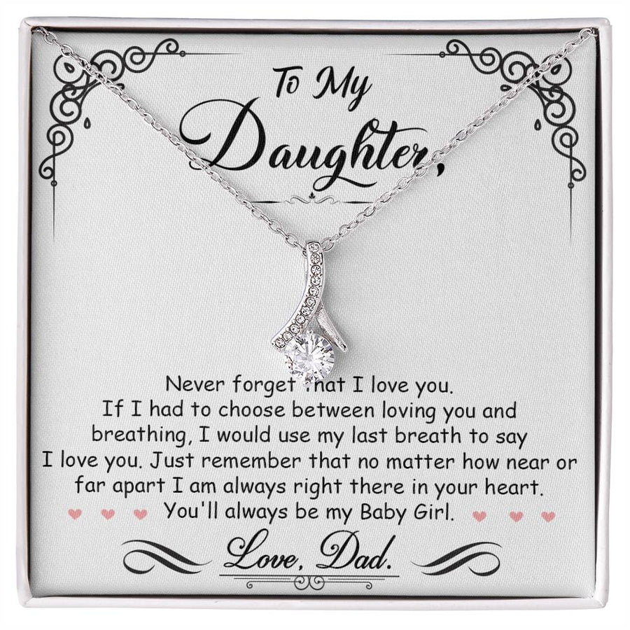 Silver ribbon pendant necklace displayed on a message card for a daughter