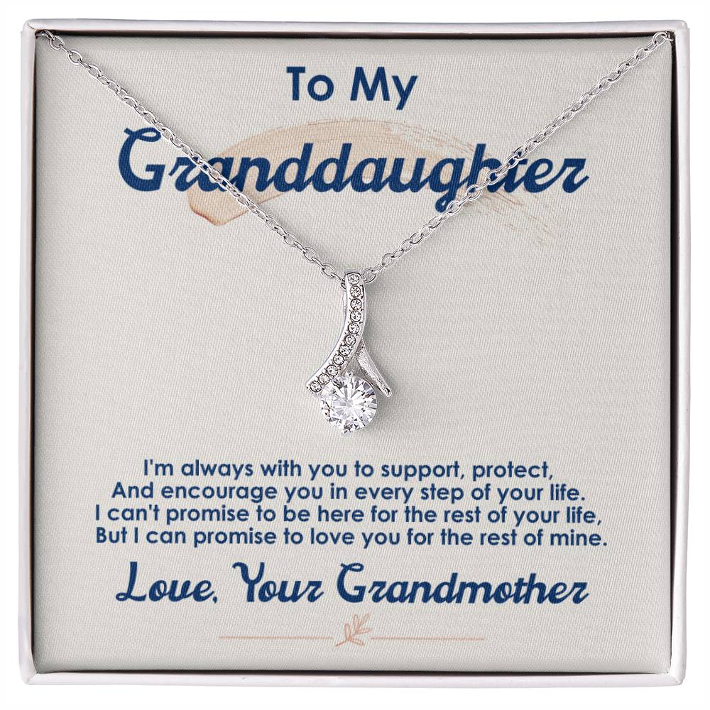 Silver-tone pendant necklace displayed on a message card for a granddaughter.