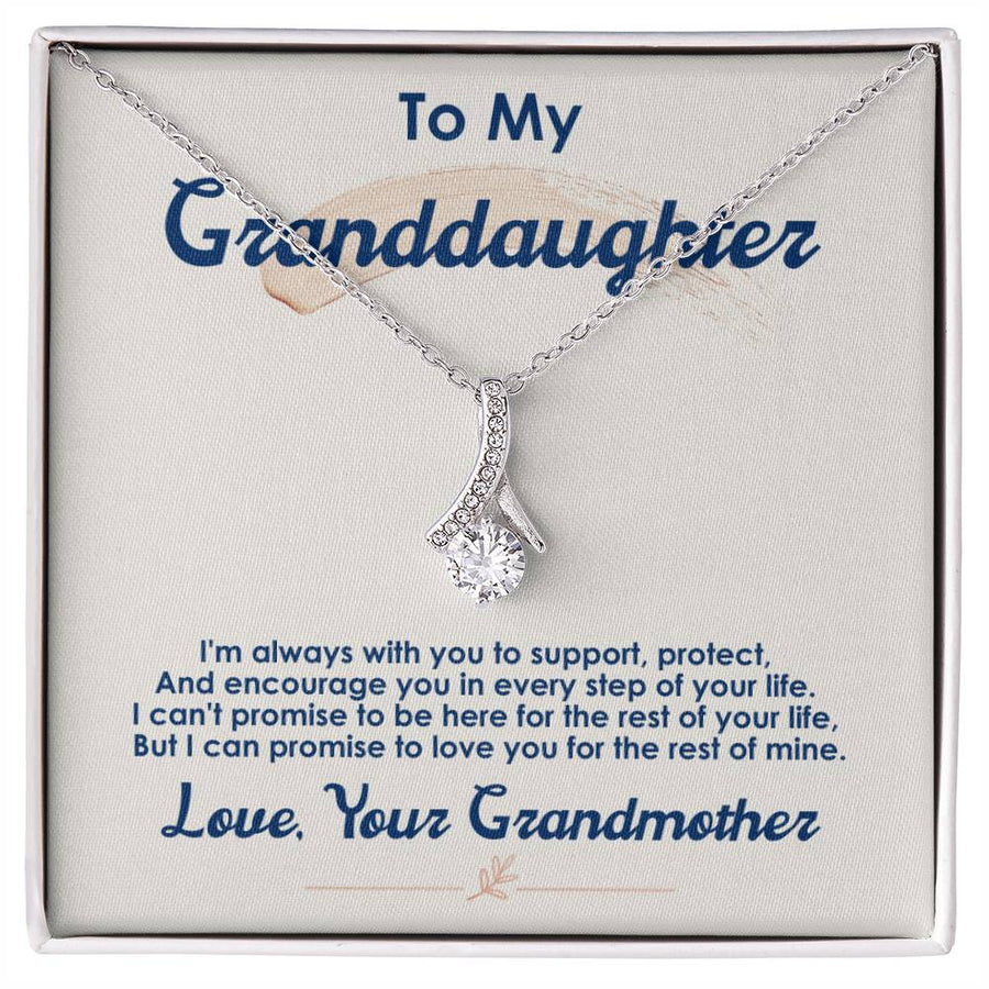 Silver-tone pendant necklace displayed on a message card for a granddaughter.