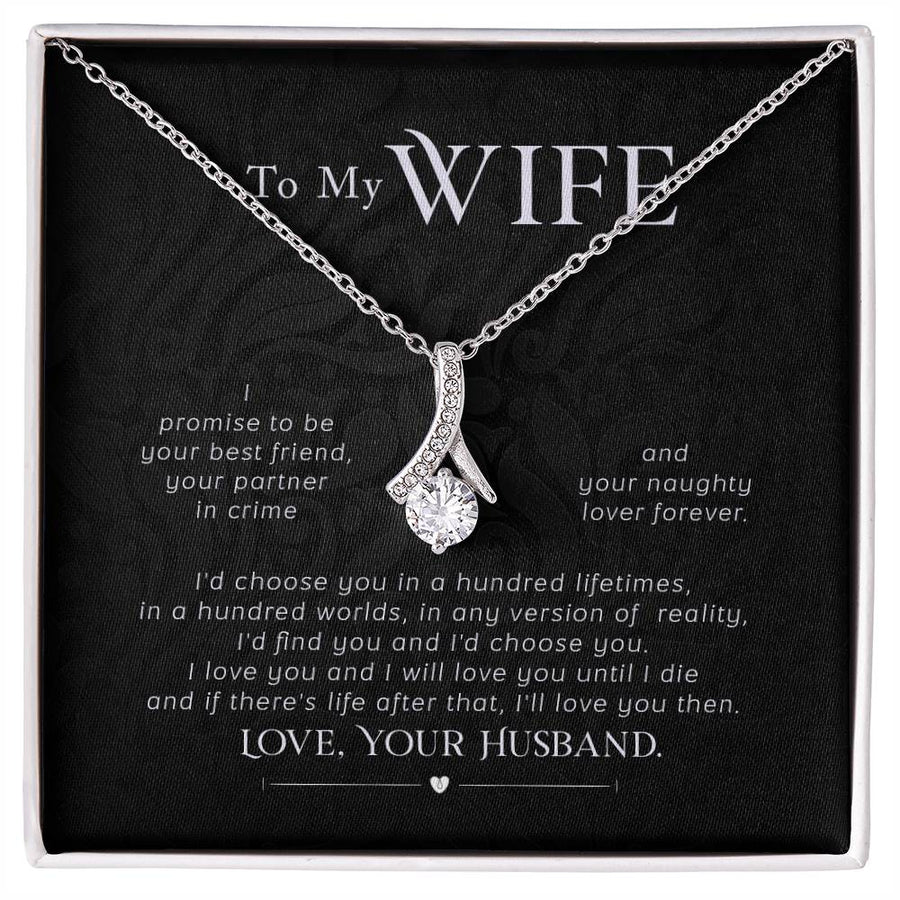 Silver-tone ribbon pendant necklace displayed on a black message card for a wife.