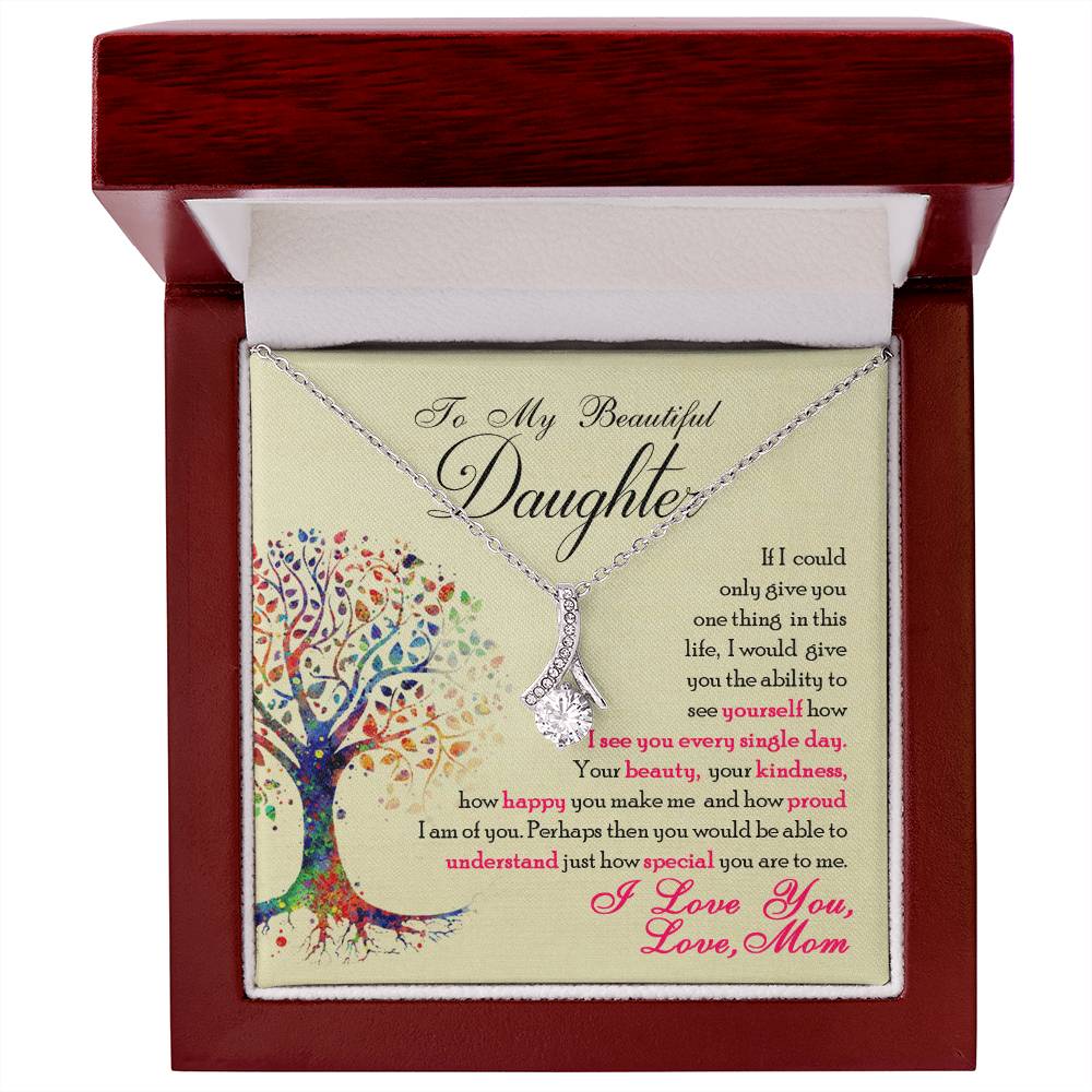Silver-tone necklace and daughter message card presented inside an open mahogany-style box.