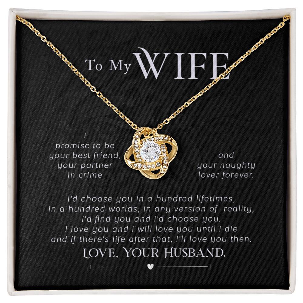 Gold-tone Love Knot necklace with cubic zirconia pendant on a wife message card