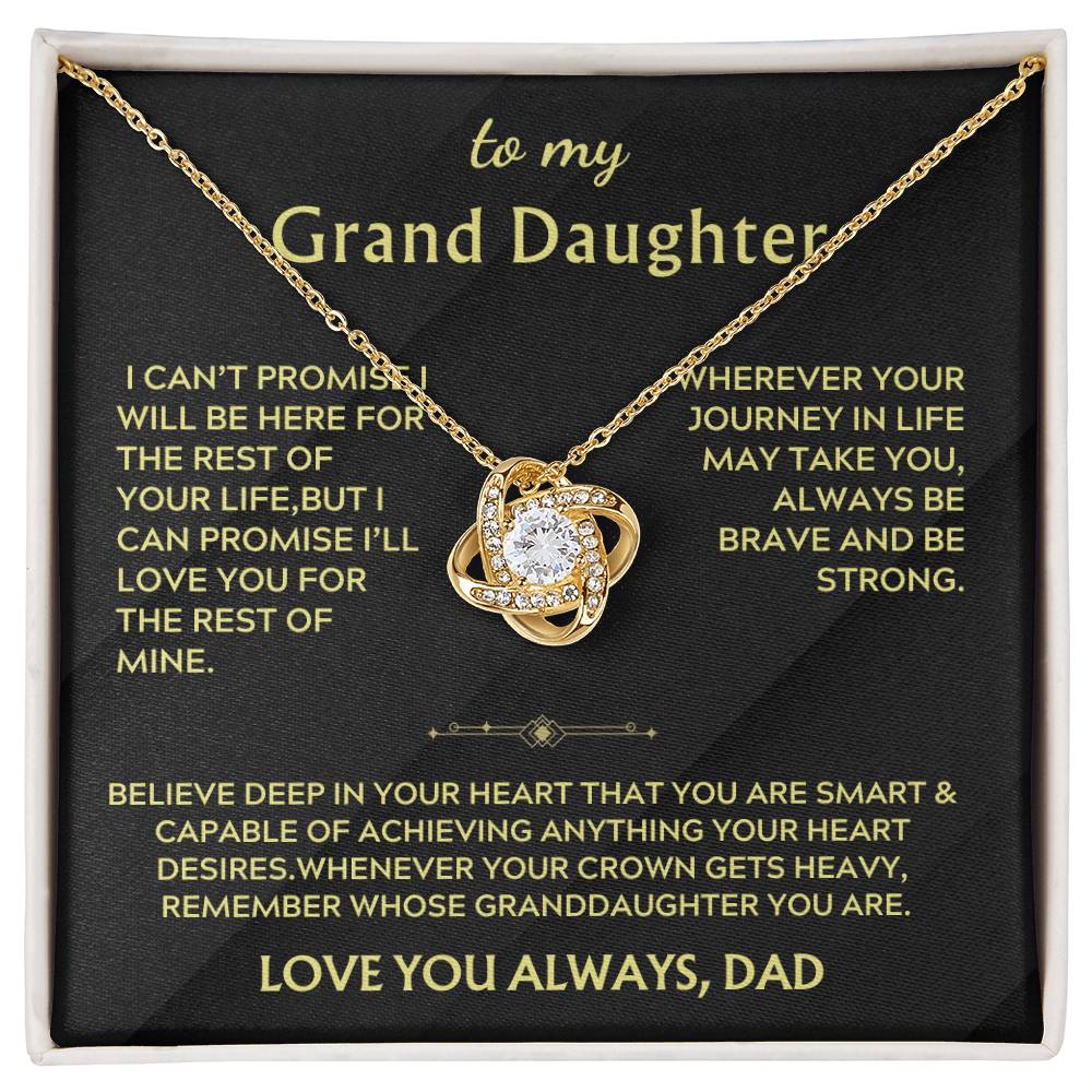 Gold Love Knot necklace displayed on a black granddaughter message card