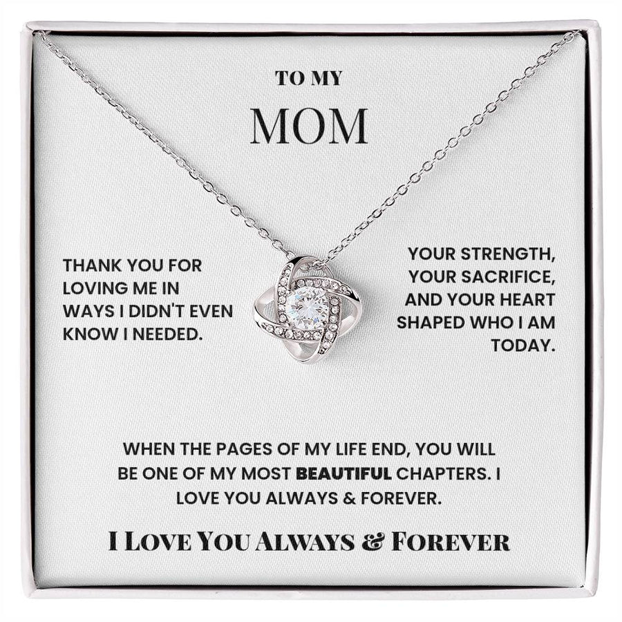 Silver love knot necklace with cubic zirconia pendant on a printed card for Mom