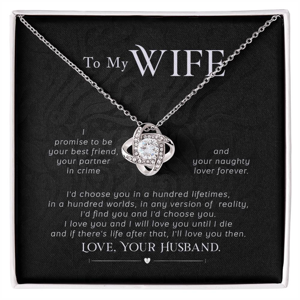 Love Knot necklace with cubic zirconia pendant on a message card for a wife