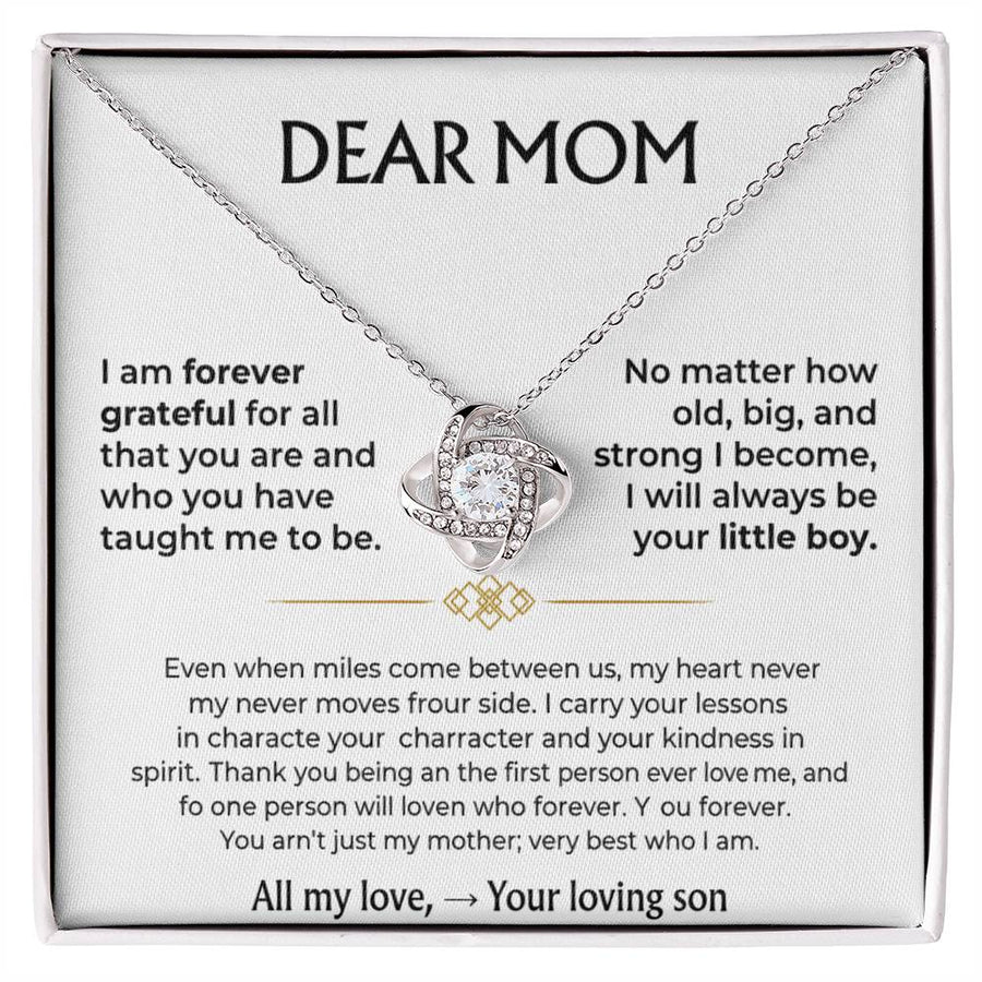 Love Knot necklace with clear cubic zirconia pendant on a printed Dear Mom card