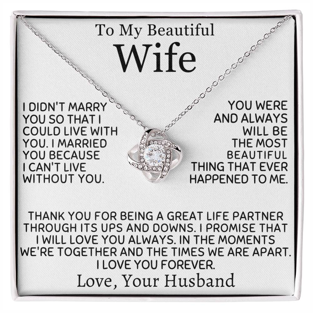 Silver Love Knot Necklace displayed across a printed message card for a wife