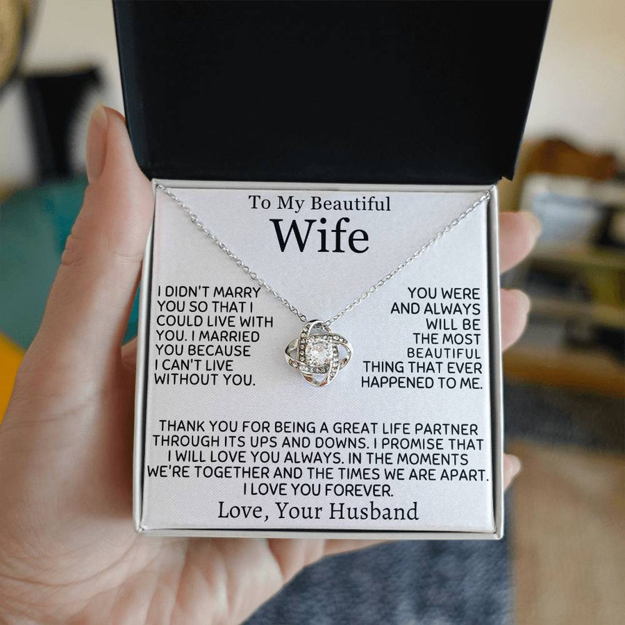 Silver Love Knot Necklace presented in an open black jewellery box with a wife message card