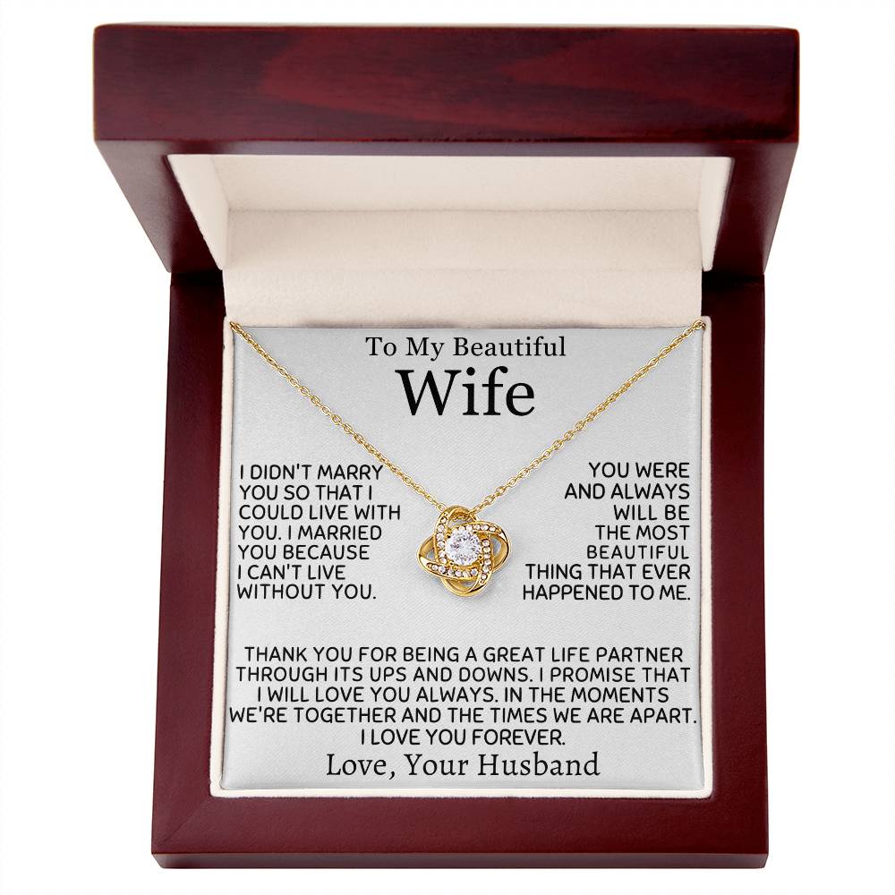 Gold Love Knot Necklace and wife message card displayed in an open mahogany gift box