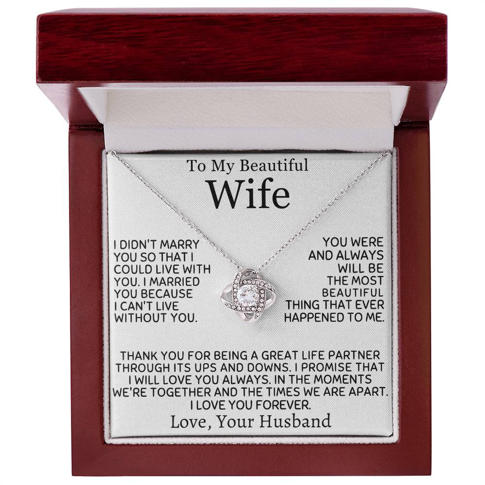 Silver Love Knot Necklace and wife message card presented in an open mahogany gift box