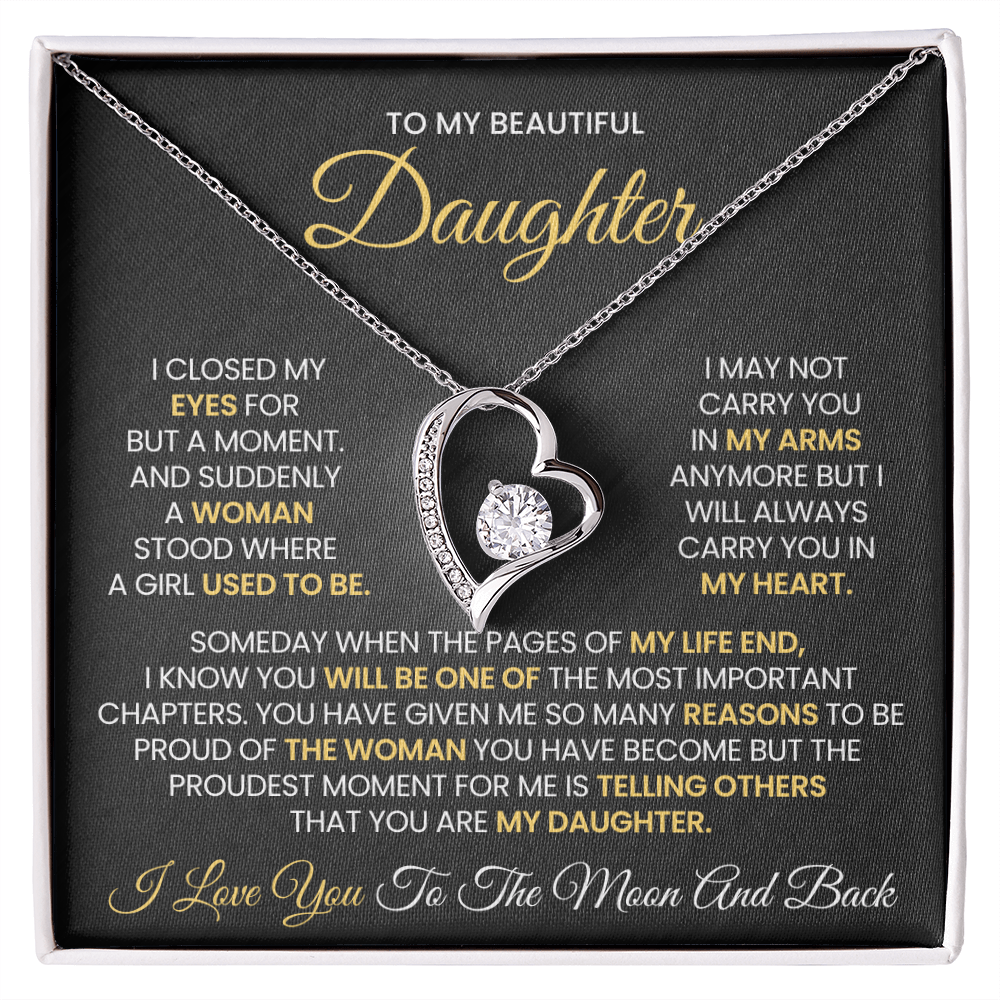 Silver heart necklace displayed on a black message card for a daughter