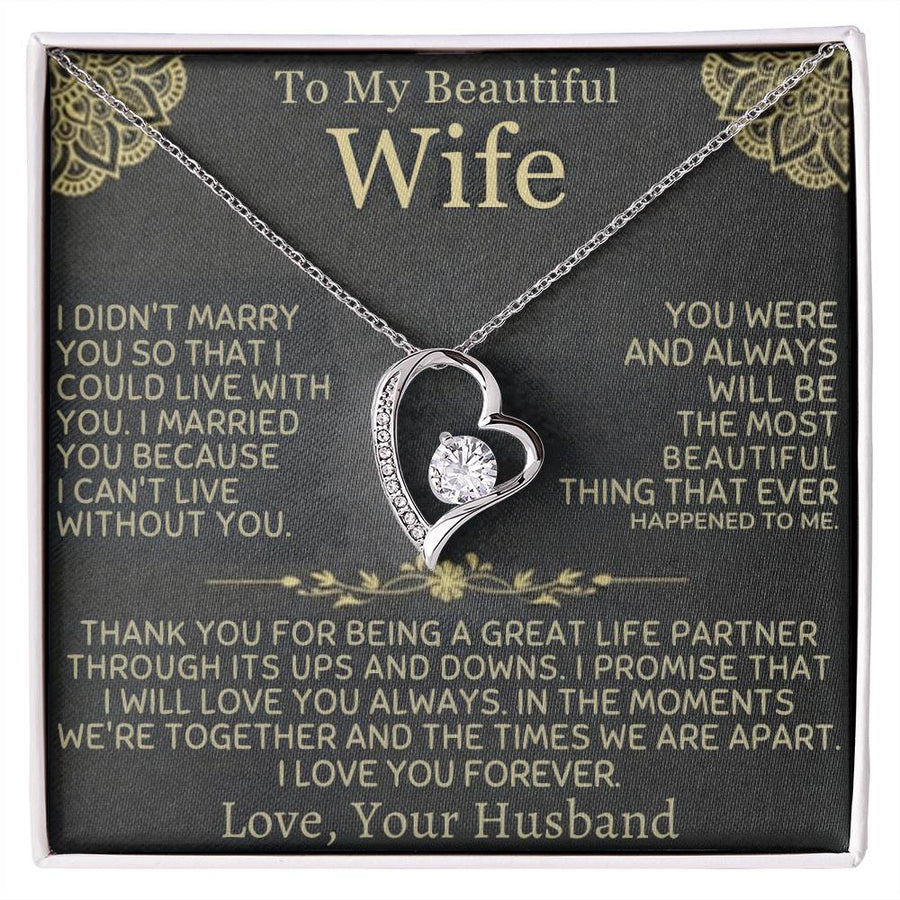 Heart pendant necklace displayed on a message card addressed to a beautiful wife in a white box.