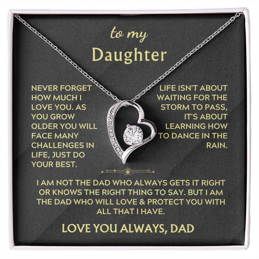 Heart-shaped crystal pendant necklace displayed on a black message card in a white box