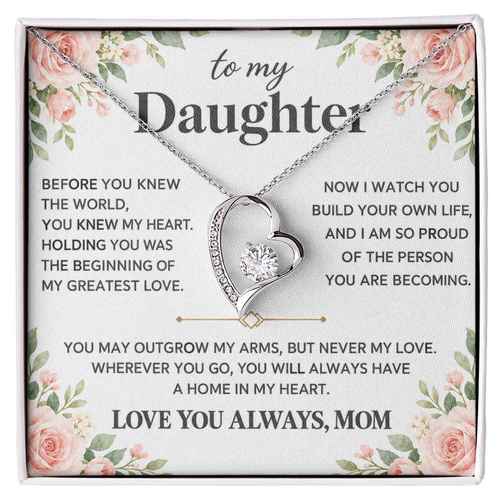 Heart pendant necklace displayed on a floral Daughter message card in a white presentation box.