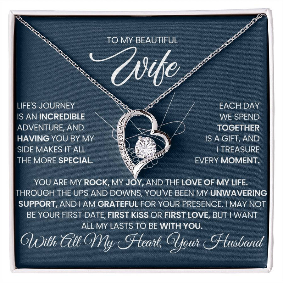 Silver heart pendant necklace displayed on a blue message card for a wife