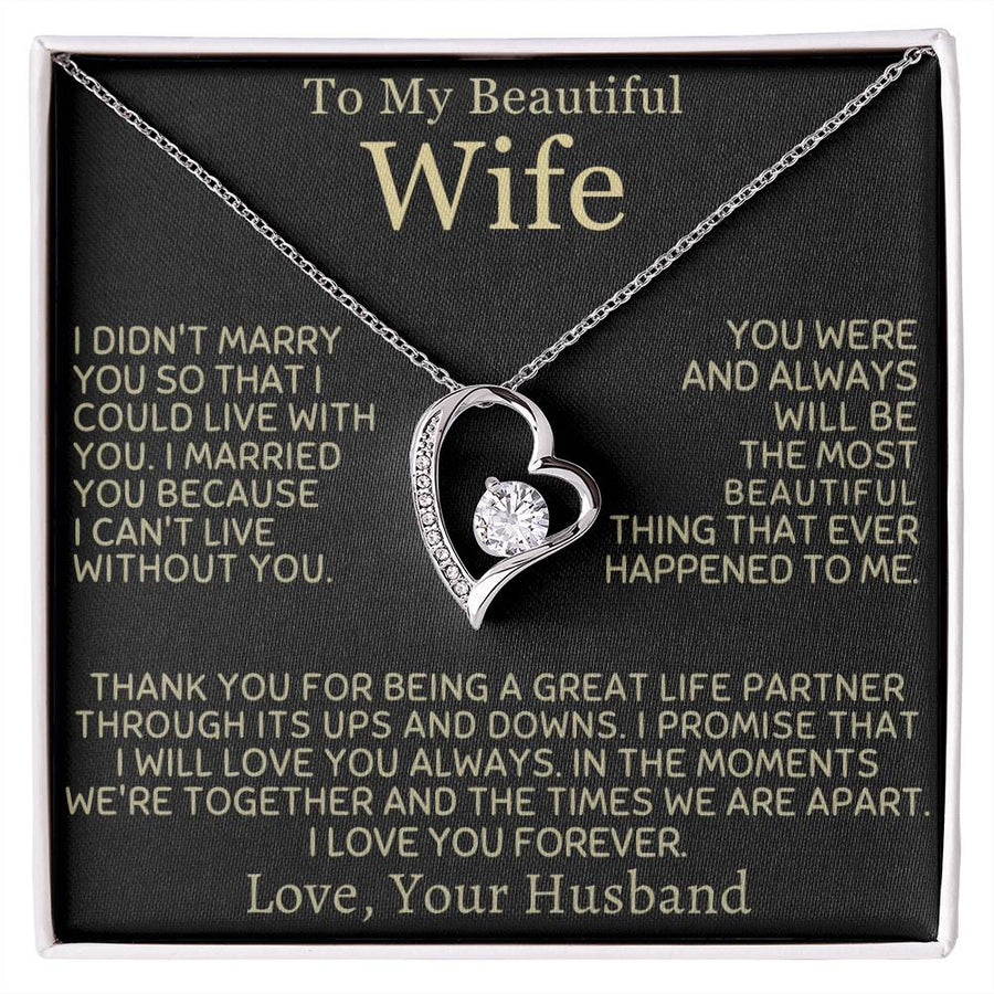 Heart-shaped crystal pendant necklace displayed on a black message card for a wife.