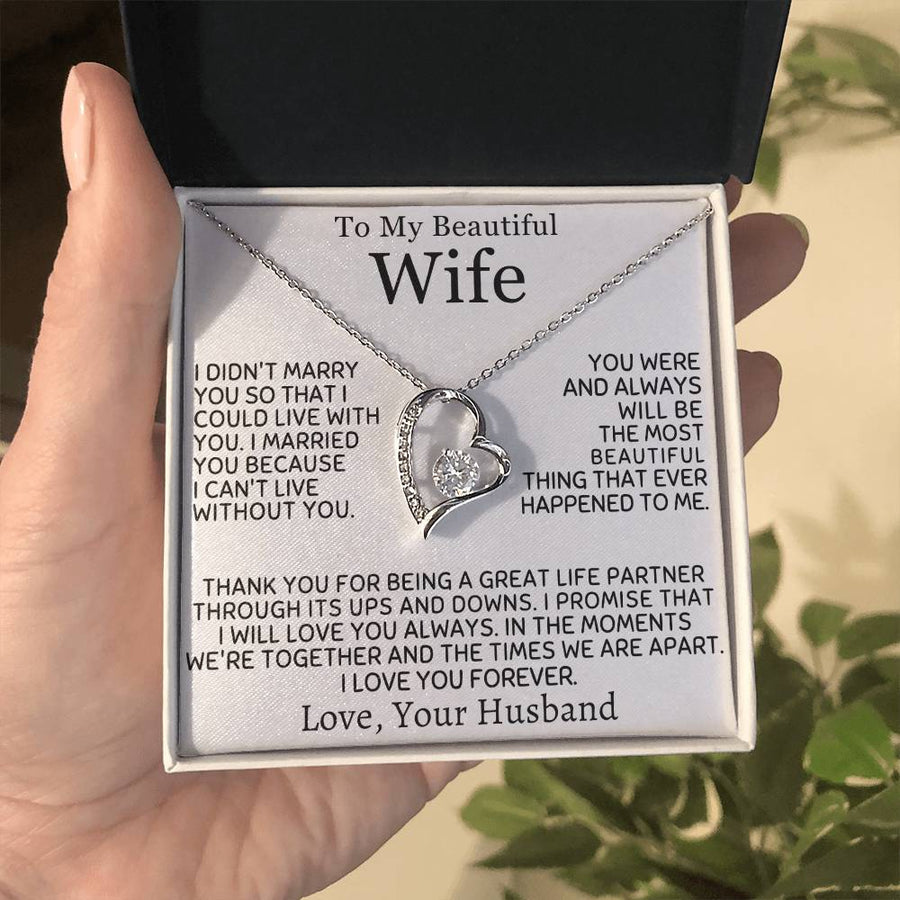 Silver heart necklace and wife message card presented in an open jewellery box