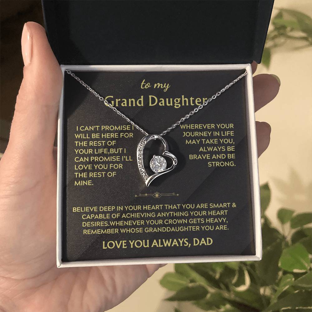 Silver heart necklace displayed in an open presentation box with a Grand Daughter message card
