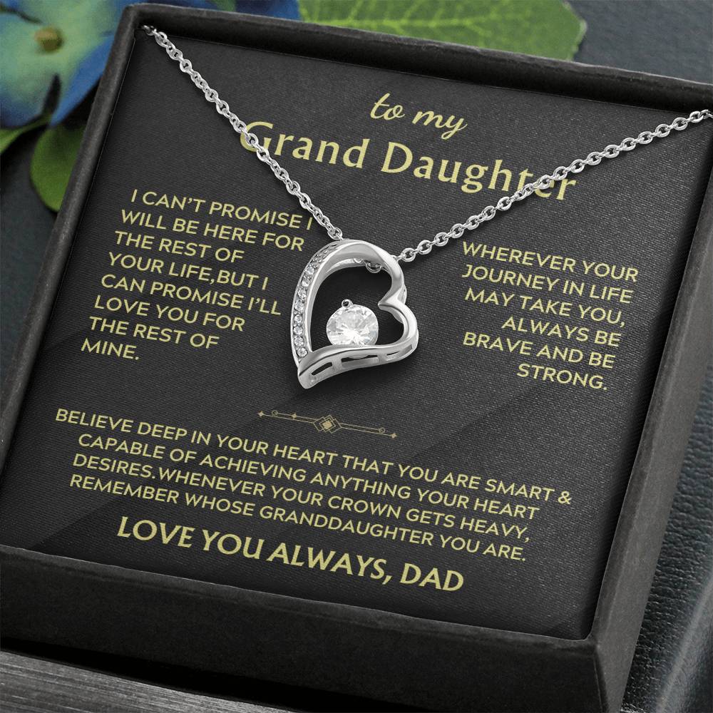 Silver heart pendant necklace in a black presentation box with a Grand Daughter message card